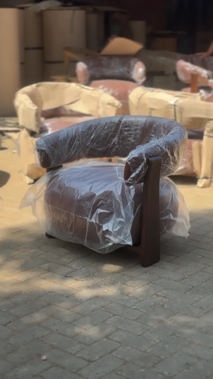 An armchair wrapped for shipping