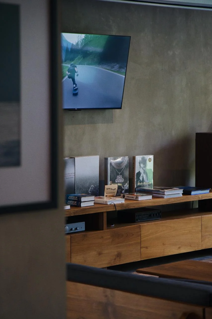 Surf Motel lobby with custom teak furniture and indigo accents, Echo Beach Canggu Bali